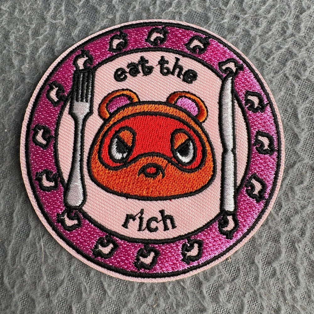 Eat The Rich Tom Nook Animal Crossing Iron On Patch Pink Orange 3 Inch
